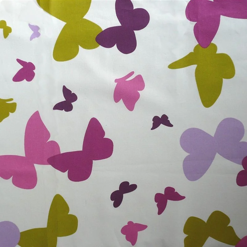 Tissu en coton enduit Papillon vert/prune