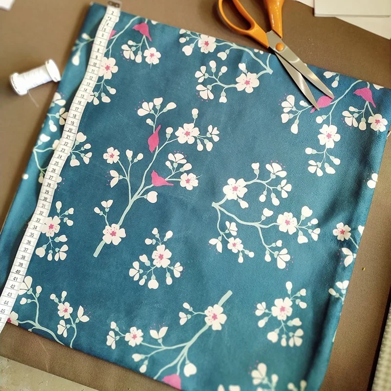 Beschichtete Baumwolle meterwarm Astrancia grau