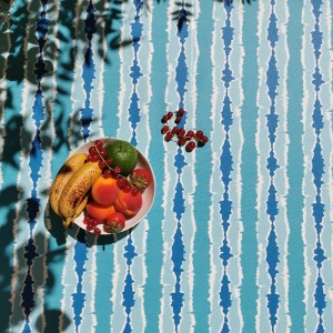 Nappe enduite anti tache ronde ou ovale ikat turquoise  