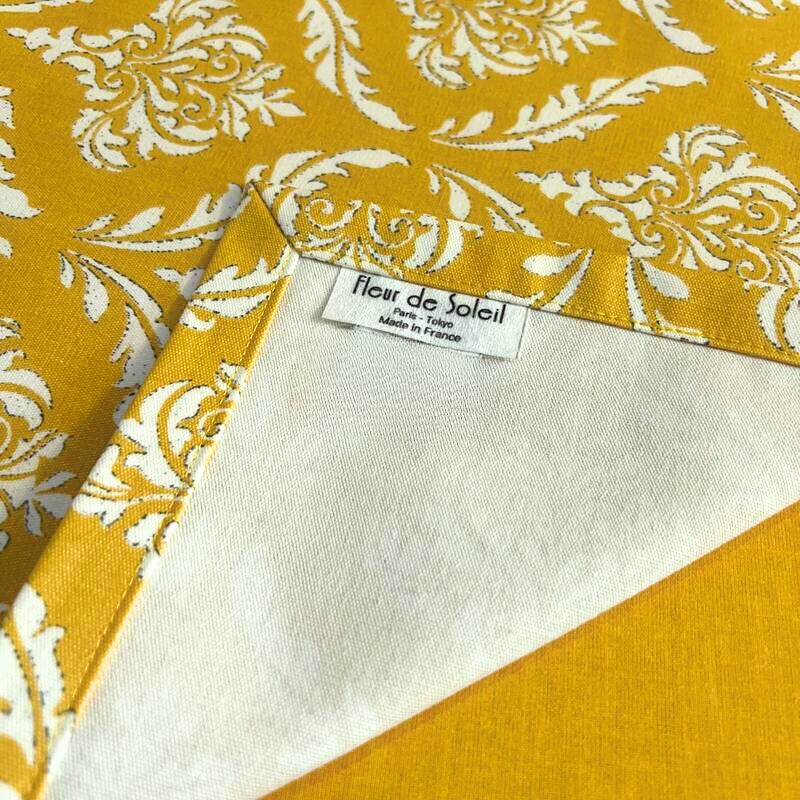 Tovaglietta gialla idrorepellente Pompadour in cotone rivestito