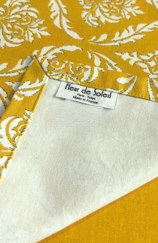 Tovaglietta gialla idrorepellente Pompadour in cotone rivestito