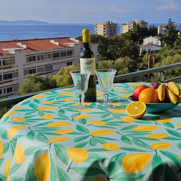 Wipe clean tablecloth Round or oval Lemons